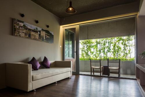 The living room area has a very convenient view of the garden