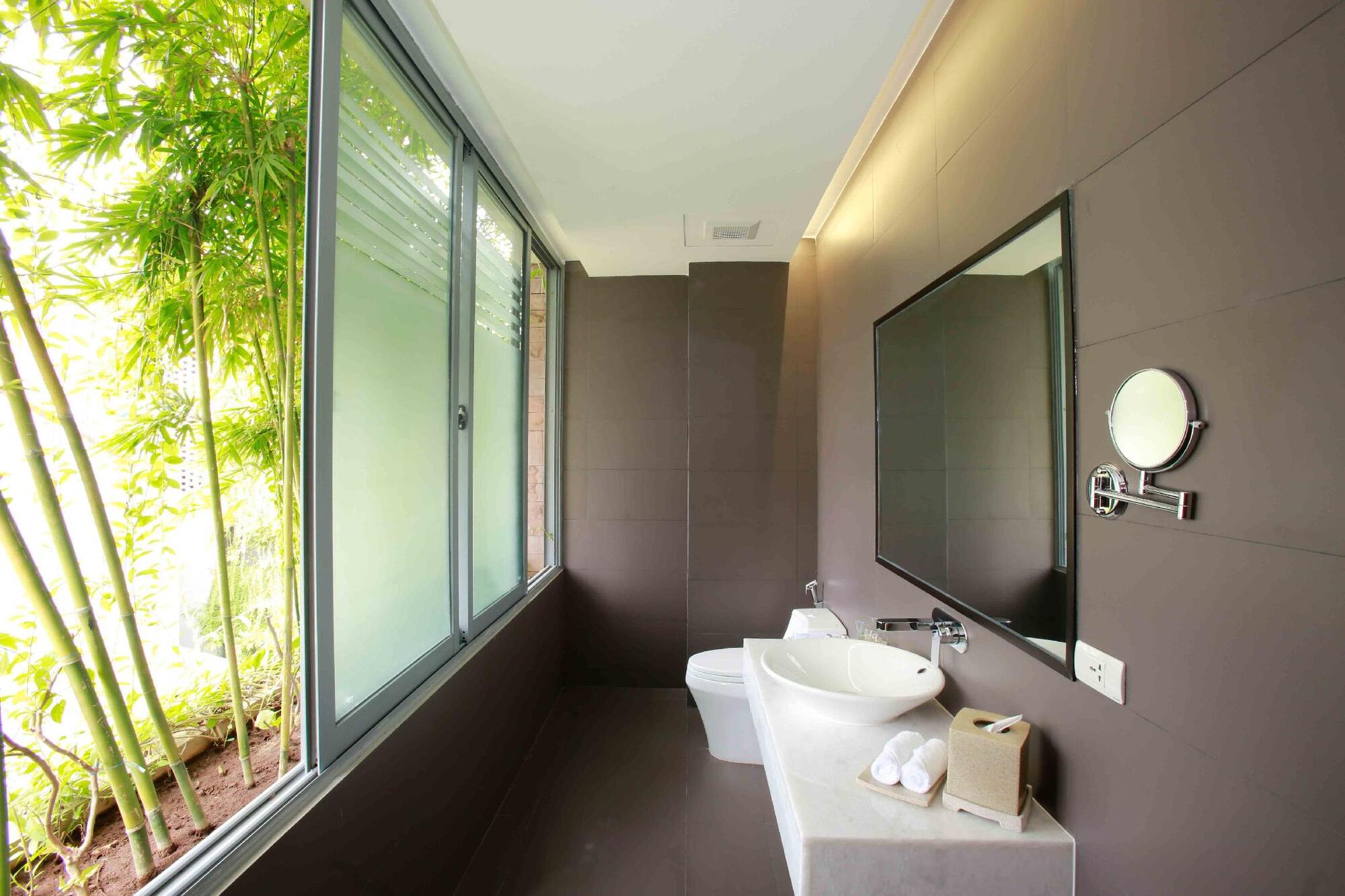 The bathroom area is exposed to the outside space