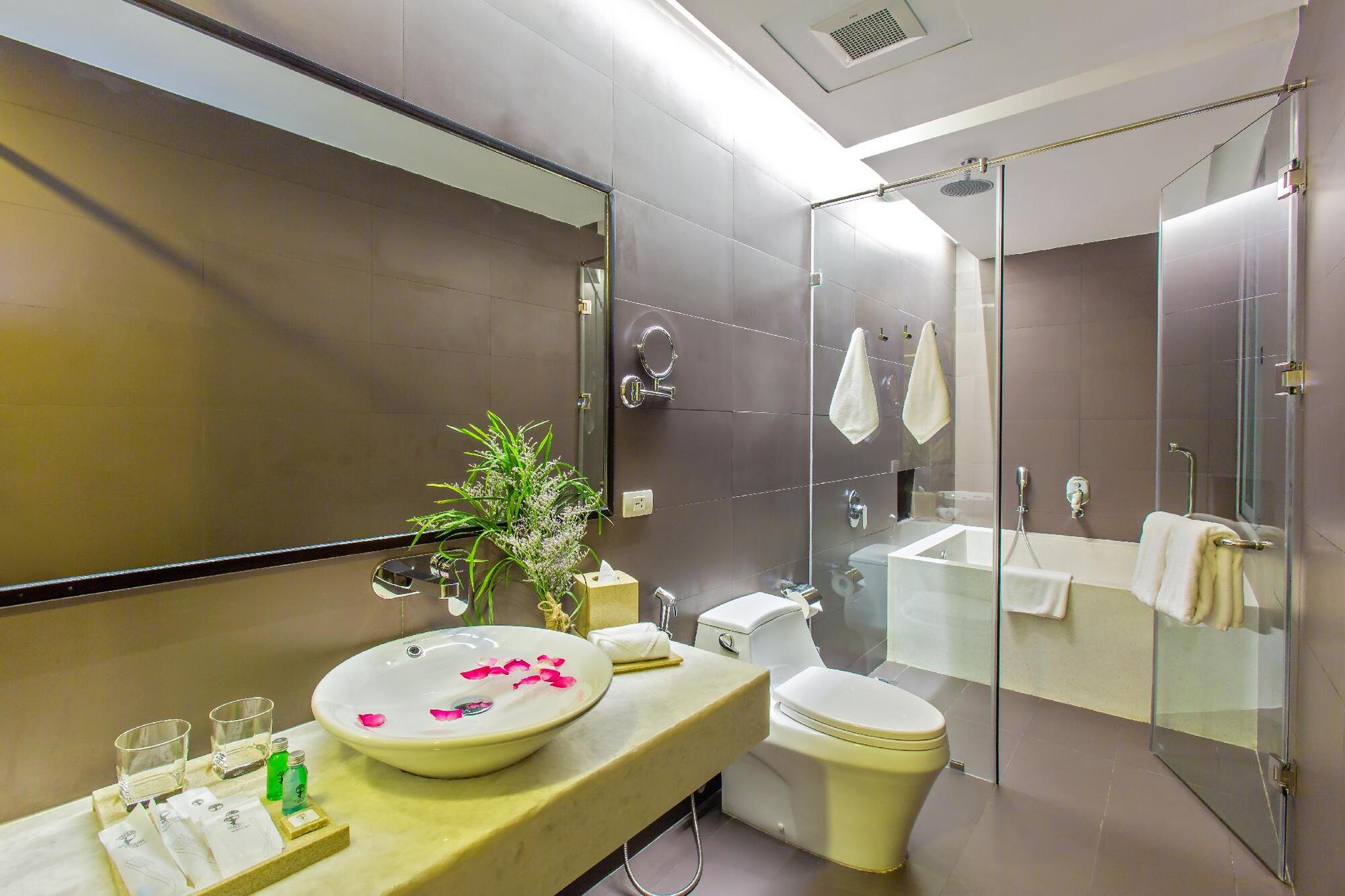 Spacious bathroom space with transparent design with glass panels